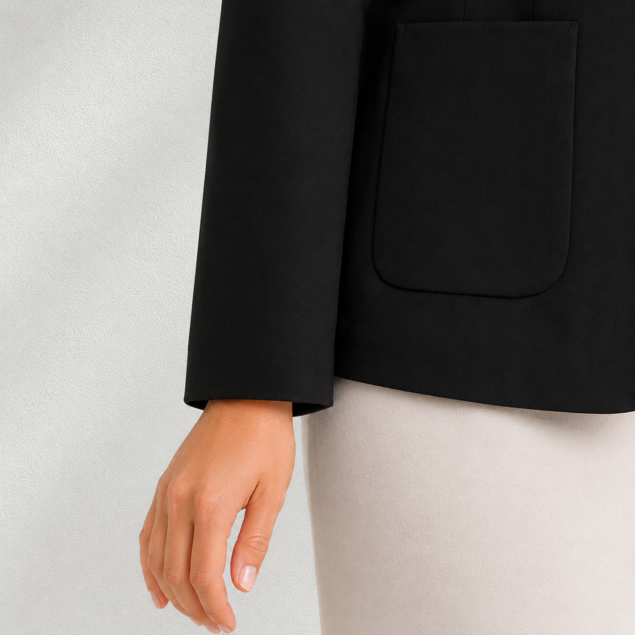 Détail de la manche du blazer noir River Woods sans boutons au poignet