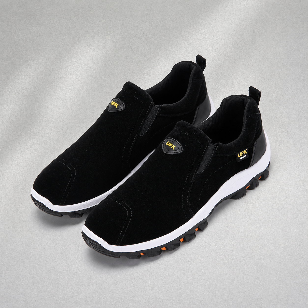 Chaussures homme noires sans lacets avec semelle crantée