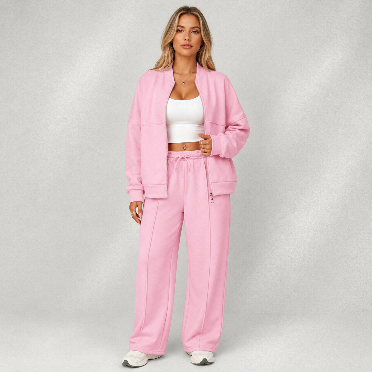 Survêtement femme rose 2 pièces avec veste zippée, pantalon large et top blanc