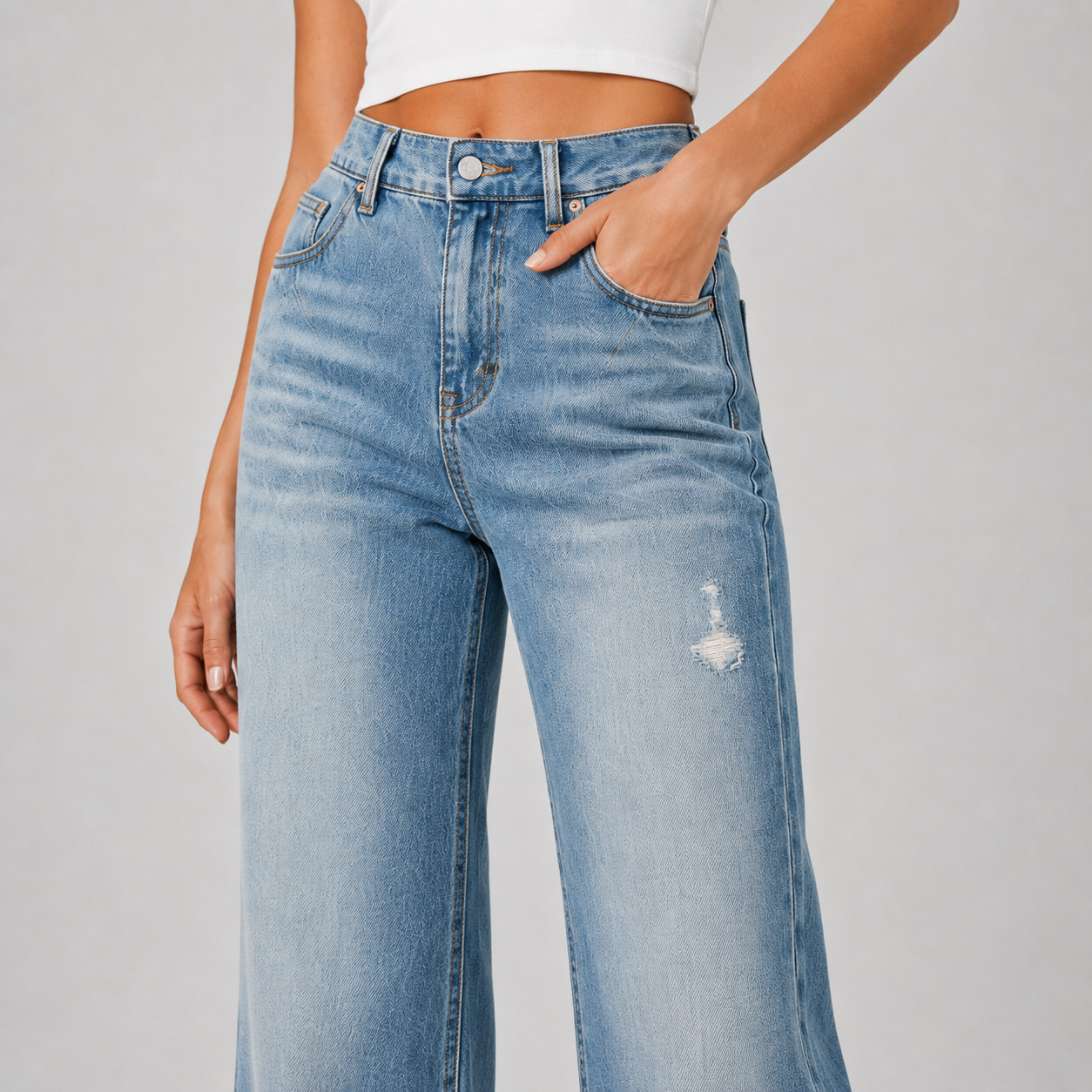 Détail taille haute pantalon denim femme bleu clair