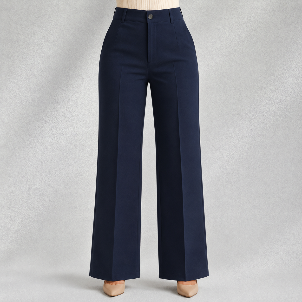 Pantalon bleu marine taille haute à coupe large sur fond clair